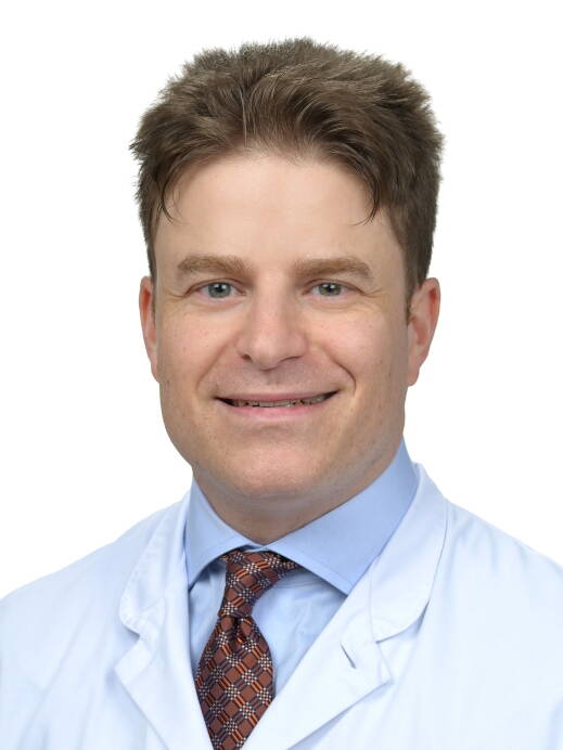 Portraitfoto von Dr. med. Patric Micha Urfer, Magen-Darm-Spezialist und Inhaber der Praxis abdominis